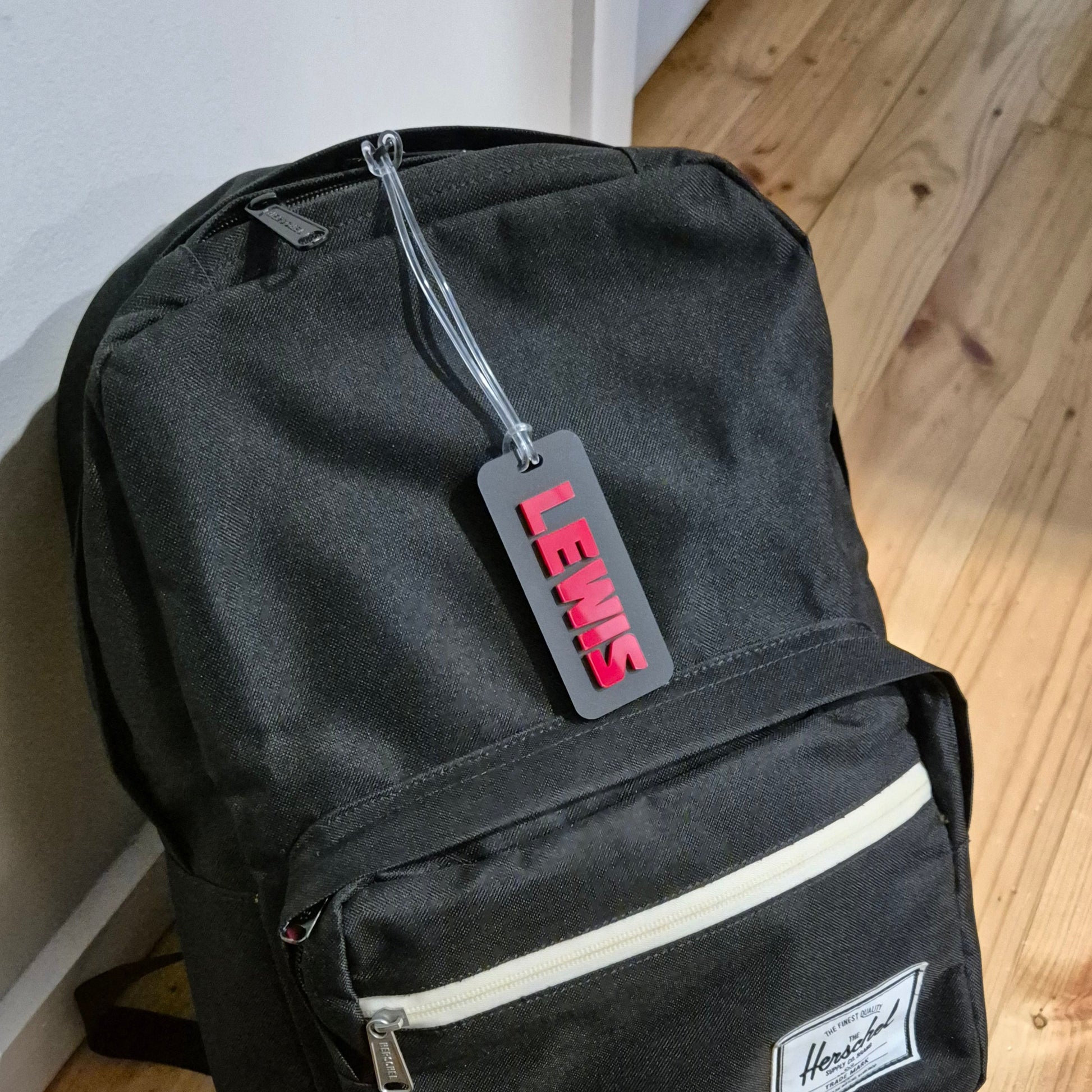 Backpack with acrylic bag tag