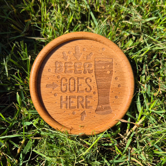 engraved round wooden coaster beer goes here