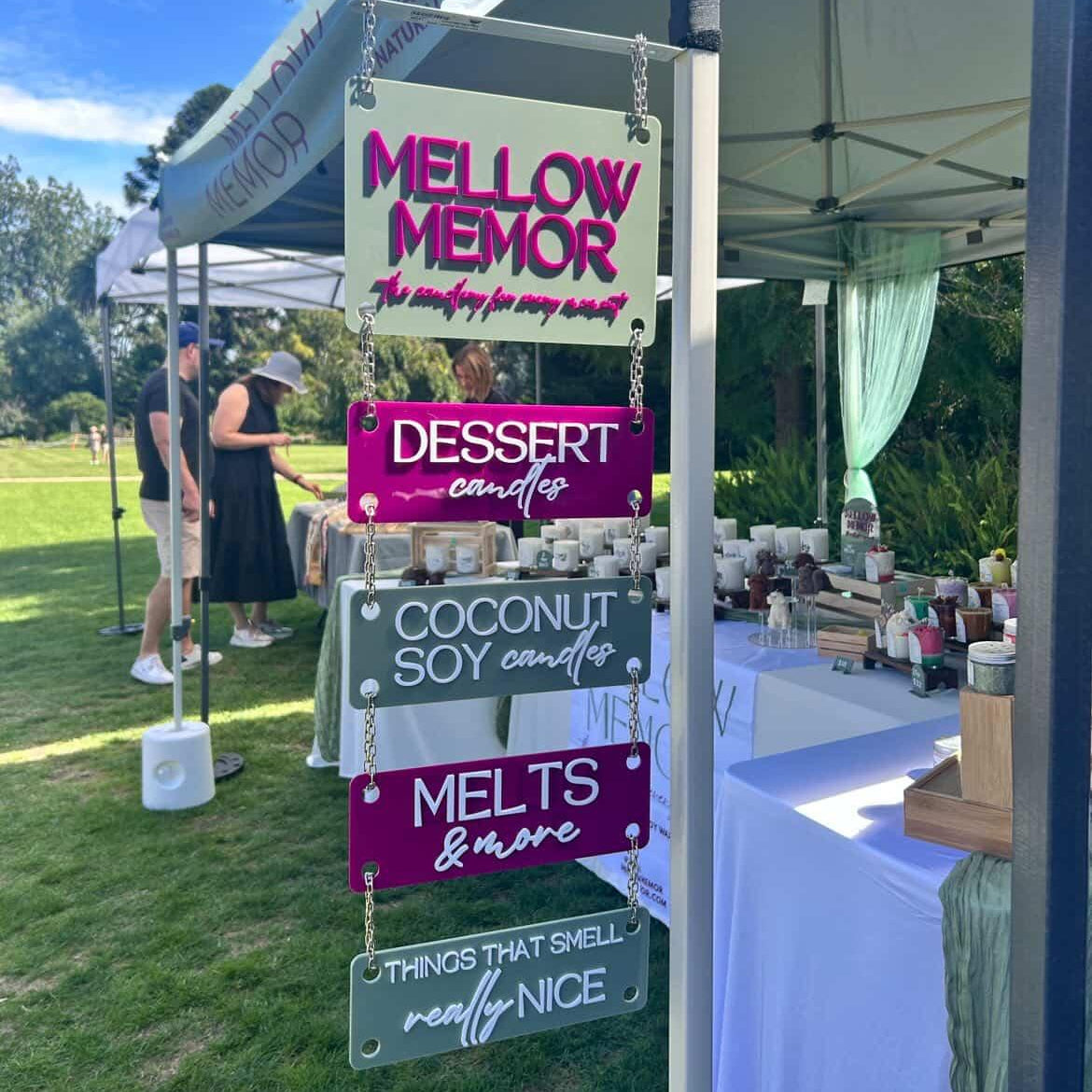 Acrylic Hanging Sign with Connectable Panels made from acrylic used at a market to show what this vendor sells