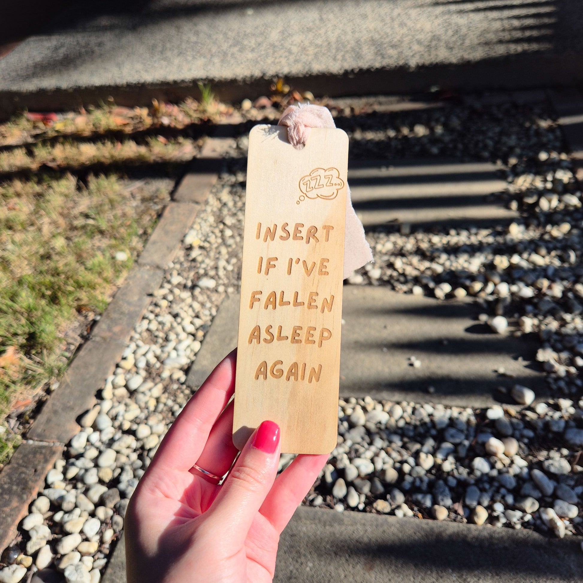 plywood bookmark insert if I've fallen asleep again 