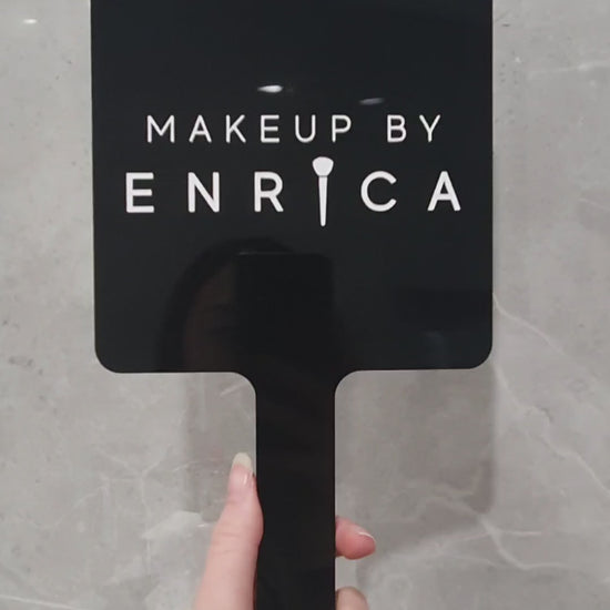 Video of handheld mirror with engraved logo